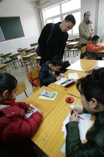 Parents and their children during the entrance exam of The Elementary School Affiliated to Renmin University of China. (Photo: Li Hao/GT)