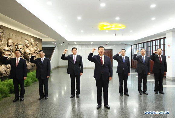 Xi Jinping leads other members of the Standing Committee of the Political Bureau of the Communist Party of China (CPC) Central Committee to review the oath of the CPC when visiting the site where the first CPC National Congress was held in 1921, in Shanghai, east China, Oct. 31, 2017. (Xinhua/Lan Hongguang)