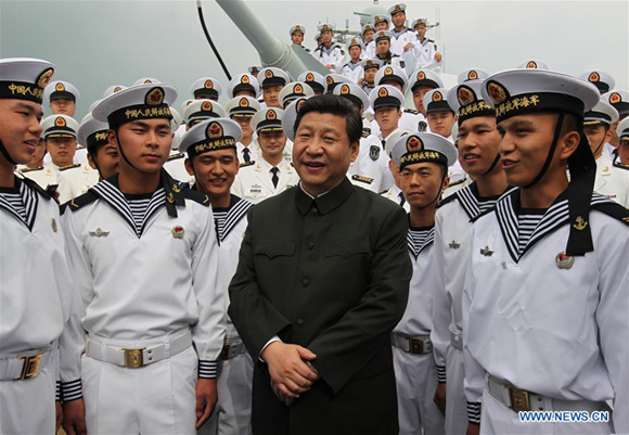 Xi Jinping talks with soldiers onboard the Navy destroyer Haikou during his inspection at the Guangzhou military theater of operations of the People's Liberation Army (PLA), Dec. 8, 2012. (Xinhua/Wang Jianmin)