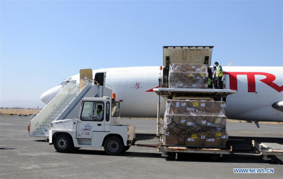 Workers unload aid from a plane at Sanaa International Airport in Sanaa, Yemen, on Nov. 25, 2017. (Xinhua/Mohammed Mohammed)