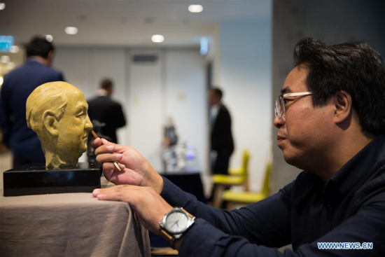 An artist shows clay-sculpting skills in the China Cultural Center in Tel Aviv, Israel, on Nov. 26, 2017. The first China Cultural Center in West Asia opened in Israel's central city of Tel Aviv on Sunday, aiming to spread the Chinese culture and facilitate exchange and cooperation between the two countries. (Xinhua/Guo Yu)