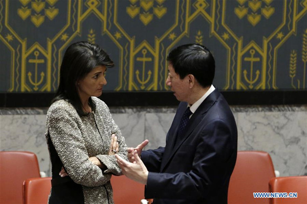 U.S. Ambassador to the United Nations Nikki Haley (L) speaks with Wu Haitao, the charge d'affaires of China's Permanent Mission to the United Nations, after a Security Council urgent meeting on the Tuesday's missile launch by the Democratic People's Republic of Korea (DPRK), at the UN headquarters in New York, Nov. 29, 2017. (Xinhua/Li Muzi)