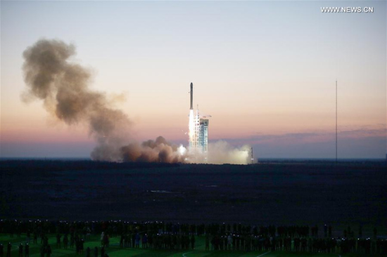 Photo taken on Dec. 17, 2015 shows a Long March 2-D rocket carrying the Dark Matter Particle Explorer satellite blasting off. China's Dark Matter Particle Explorer (DAMPE) has detected unexpected and mysterious signals in its measurement of high-energy cosmic rays, which might bring scientists a step closer to shedding light on invisible dark matter.  (Xinhua/Jin Liwang)