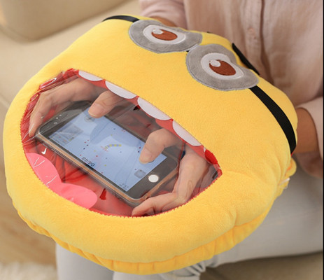 A screenshot from Taobao shows a woman using her mobile phone with her hands inside a hand heater.