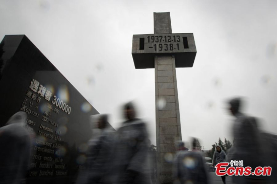 Photo taken on Dec. 13, 2016 shows the scene of state memorial ceremony for China's third National Memorial Day for Nanjing Massacre Victims at the memorial hall for the massacre victims in Nanjing, east China's Jiangsu Province. (Photo: China News Service/ Yang Bo)