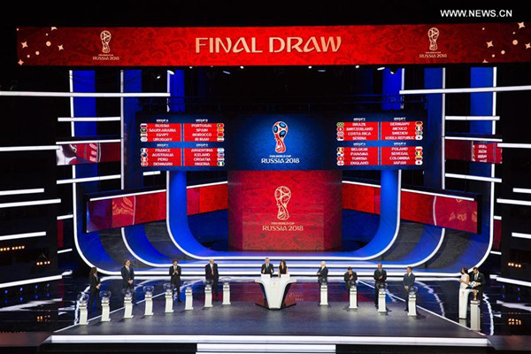 The result of the draw is shown on the screen during the Final Draw of the FIFA World Cup 2018 at the Kremlin Palace in Moscow, capital of Russia, Dec. 1, 2017. (Xinhua/Bai Xueqi)