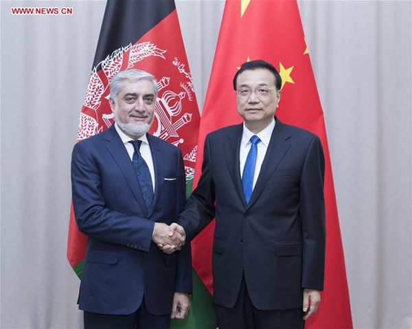 Chinese Premier Li Keqiang meets with Afghan government Chief Executive Abdullah Abdullah in Sochi, Russia, Dec. 1, 2017. (Xinhua/Wang Ye)