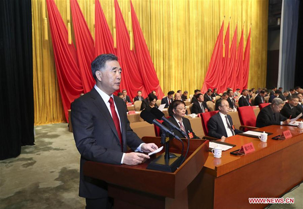 Chinese Vice Premier Wang Yang, also a member of the Standing Committee of the Political Bureau of the Communist Party of China (CPC) Central Committee, delivers a congratulatory message to the China Association for Promoting Democracy (CAPD) at the opening session of its 12th National Congress on behalf of the CPC Central Committee in Beijing, capital of China, Dec. 1, 2017. (Xinhua/Pang Xinglei)