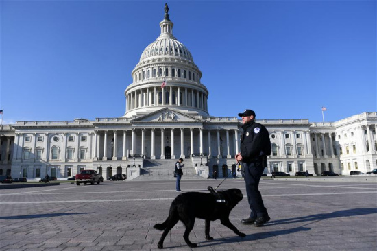 A policeman patrols on the Capitol in Washington D.C., the United States, on Dec. 1, 2017. (Xinhua/Yin Bogu)
