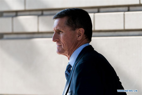 Former U.S. National Security Adviser Michael Flynn leaves the federal court following his plea hearing in Washington D.C., the United States, on Dec. 1, 2017.  (Xinhua/Ting Shen)