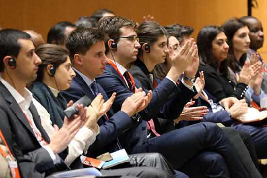 Delegates of political parties respond during a panel discussion on Saturday in Beijing. WANG ZHUANGFEI/CHINA DAILY