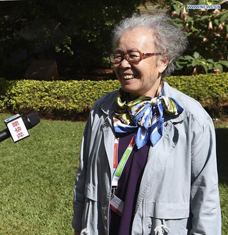 Representative Liu Haiying from the Saihanba Afforestation Community receives an interview with Xinhua in Nairobi, Kenya, Dec. 4, 2017. Saihanba Afforestation Community in north China's Hebei Province received the United Nations' highest environmental honor, the Champions of the Earth award, during the UN Environment Assembly in Nairobi, for transforming degraded land into a lush paradise. (Xinhua/Chen Cheng)