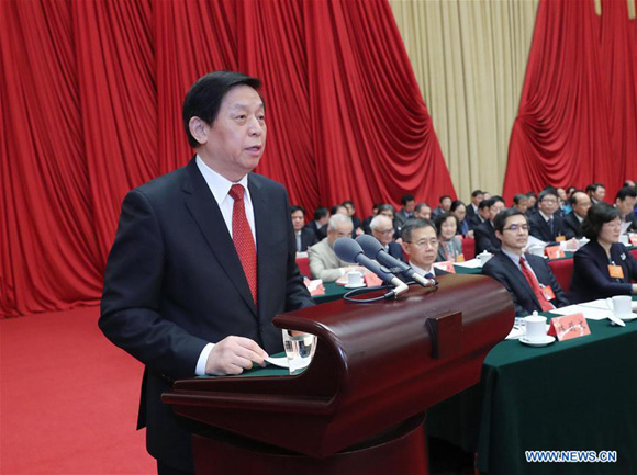 Li Zhanshu, member of the Standing Committee of the Political Bureau of the Communist Party of China (CPC) Central Committee, reads a congratulatory message on behalf of the CPC Central Committee at the 12th national congress of the China Democratic League (CDL) in Beijing, capital of China, Dec. 6, 2017. The congress opened in Beijing on Wednesday. (Xinhua/Liu Weibing)