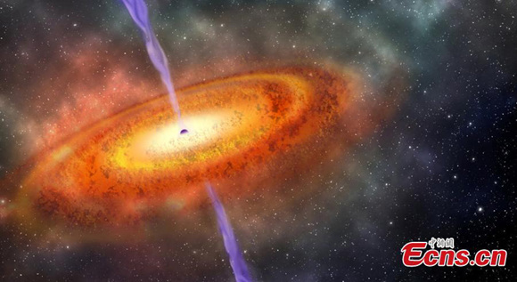 An artist's conception of the most-distant and oldest supermassive black hole ever discovered .The black hole resides in a quasar and its light had been traveling for 13 billion years before reaching Earth. It's a truly gargantuan black hole, some 800 million times the mass of our sun. The size amazed and puzzled astronomers, according to reports. (Photo/Agencies)