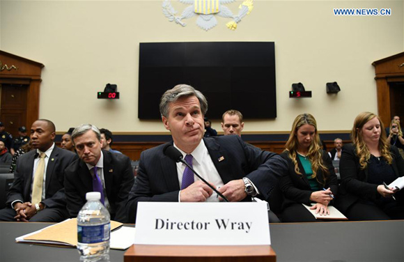 FBI Director Christopher Wray (C) arrives for a House Judiciary Committee hearing on Capitol Hill in Washington D.C., the United States, Dec. 7, 2017. FBI Director Christopher Wray defended his agency on Thursday amid sharp criticism from U.S. President Donald Trump. (Xinhua/Yin Bogu)  