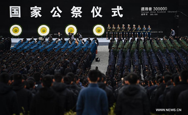Photo taken on Dec. 13, 2017 shows the scene of state memorial ceremony for China's National Memorial Day for Nanjing Massacre Victims at the memorial hall for the massacre victims in Nanjing, east China's Jiangsu Province, Dec. 13, 2017. (Xinhua/Han Yuqing)