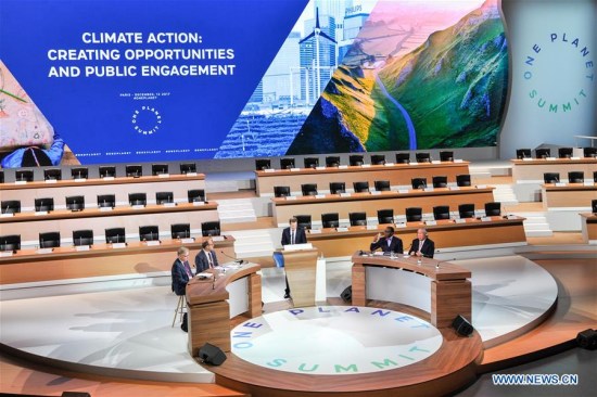 Photo taken on Dec. 12, 2017 shows a view of the panel Climate Action: Creating Opportunities and Public Engagement during the One Planet Summit in Paris, France. Political leaders and representatives of key international organizations gathered at the One Planet Summit in Paris Tuesday to address the planet's ecological emergency and accelerate international climate actions. (Xinhua/Chen Yichen)