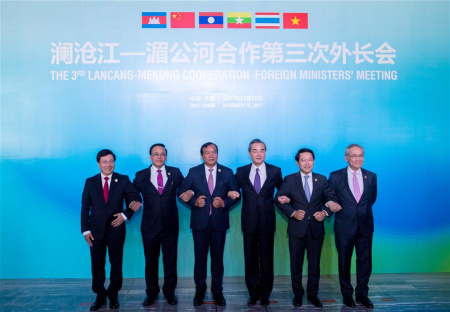 Chinese Foreign Minister Wang Yi (3rd R), Cambodian Foreign Minister Prak Sokhonn (3rd L), Thai Foreign Minister Don Pramudwinai (1st R), Lao Foreign Minister Saleumxay Kommasith (2nd R), Union Minister for International Cooperation of Myanmar U Kyaw Tin (2nd L), and Vietnamese Deputy Prime Minister and Foreign Minister Pham Binh Minh (1st L) pose for a group photo during the third Lancang-Mekong Cooperation (LMC) foreign ministers' meeting in Dali, southwest China's Yunnan Province, Dec. 15, 2017. (Xinhua/Hu Chao)