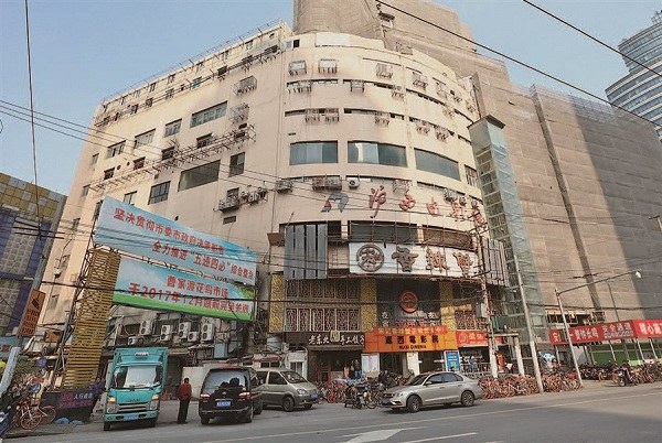 The cinema building beside the Caojiadu Flower Market will be an incubator for music, where young artists can create and record their own music. (Jiang Xiaowei)