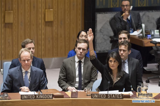U.S. Ambassador to the United Nations Nikki Haley (R, front) vetoes a UN Security Council draft resolution on the status of Jerusalem at the UN headquarters in New York, on Dec. 18, 2017. (Xinhua/UN Photo)