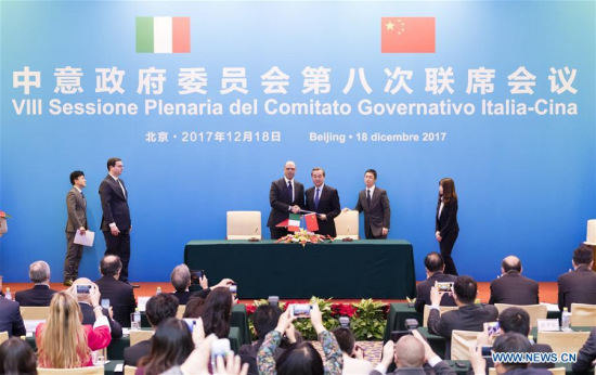 Chinese Foreign Minister Wang Yi and his Italian counterpart Angelino Alfano attend the closing ceremony of the eighth joint meeting of the China-Italy Government Committee in Beijing, capital of China, Dec. 18, 2017. Wang held talks with Alfano on Monday. (Xinhua/Ding Haitao)