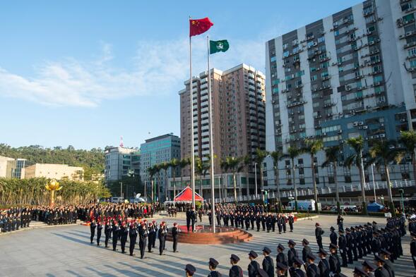 A flag-raising ceremony is held in Macao on Wednesday to celebrate the 18th anniversary of the special administrative region's return to the motherland. (Photo/Xinhua)