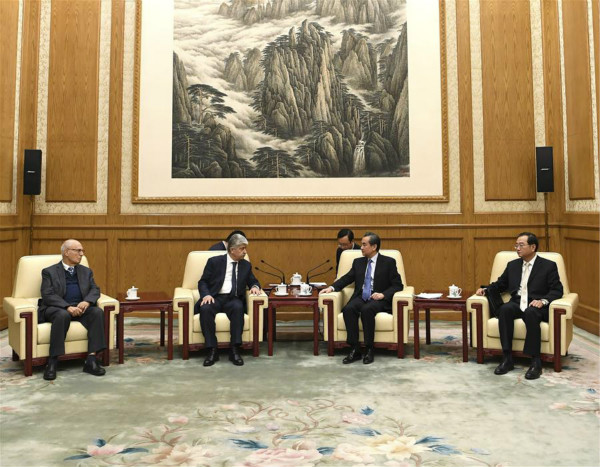 Chinese Foreign Minister Wang Yi (2nd R) meets with Ahmed Majdalani (2nd L) and Nabil Shaath (1st L), who came to China as representatives of the Palestinian President, at the Great Hall of the People in Beijing, capital of China, Dec. 22, 2017. (Xinhua/Yan Yan)