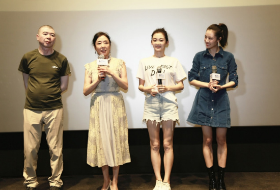 Yan Geling (second left) at a promotion for the movie Youth /CGTN Photo