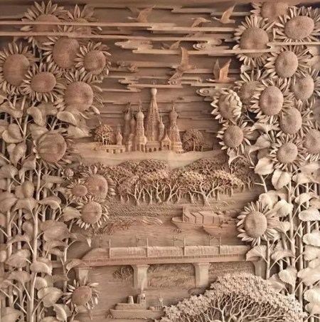 Woodcarving master Lu Guangzheng's artwork The way to the sun. ��Photo provided to CGTN��