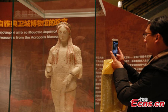 Two treasures from the Acropolis Museum in Athens are on display in Shanghai Museum, Shanghai, Jan. 10, 2018. (Photo: China News Service/Zhang Hengwei)