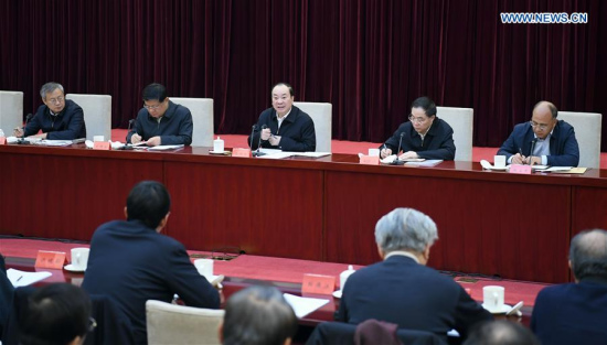 Huang Kunming (C), member of the Political Bureau of Central Committee of the Communist Party of China (CPC) and head of the Publicity Department of the CPC Central Committee, presides over a workshop on Xi Jinping Thought in Beijing, capital of China, Jan. 15, 2018. (Xinhua/Zhang Duo)