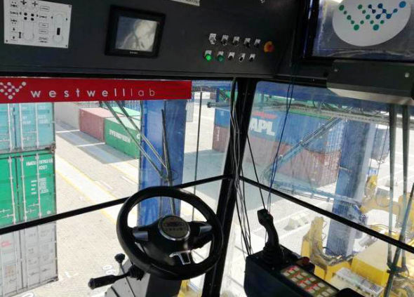 Photo of the internal view of a Chinese-produced self-driving container straddle carrier at a port in Shanghai, January 14, 2018. (Photo/jfdaily.com)
