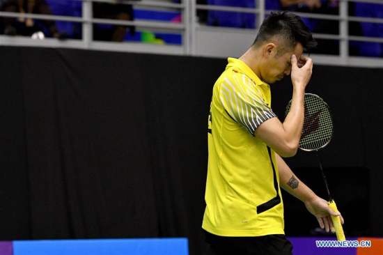 China's Lin Dan reacts during the men's singles match against Indonesia's Ihsan Maulana Mustofa at Malaysia Masters 2018 in Kuala Lumpur, Malaysia, Jan. 17, 2018. Lin Dan lost 1-2. (Xinhua/Chong Voon Chung)