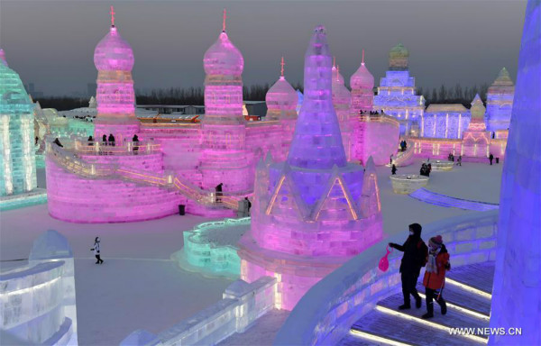 Tourists visit the Ice-Snow World in Harbin, capital of northeast China's Heilongjiang Province, Jan. 5, 2018. The 34th Harbin International Ice and Snow Festival kicked off on Friday. (Xinhua/Wang Jianwei)
