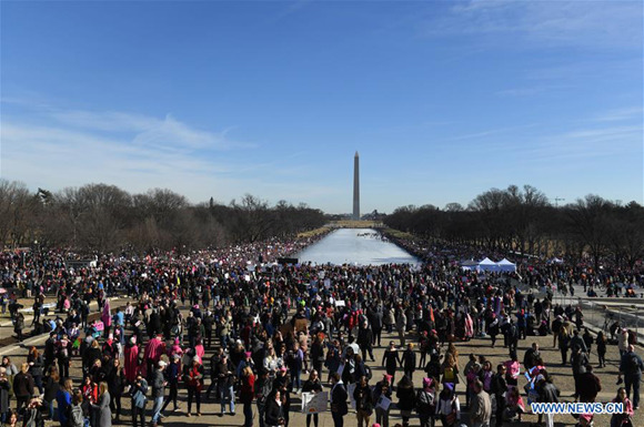 Demonstrators rally near the Lincoln Memorial Reflecting Pool and Washington Monument during the Women's March in Washington D.C., the United States, on Jan. 20, 2018. Tens of thousands of people gathered here demanding for women's rights on Saturday. (Xinhua/Yin Bogu)