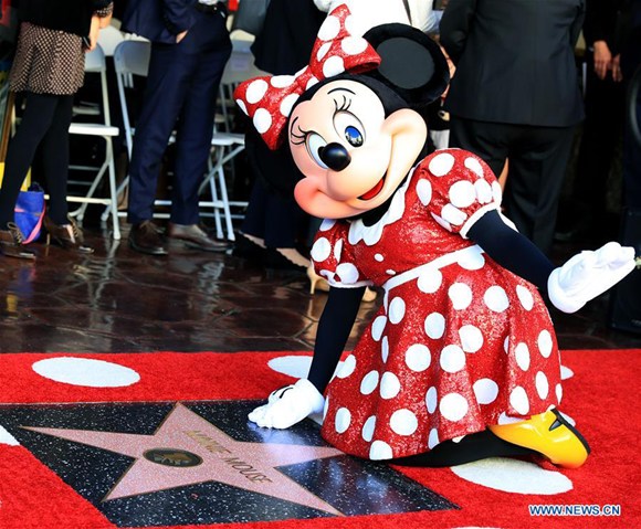Disney character Minnie Mouse attends a star honoring ceremony on the Hollywood Walk of Fame in Los Angeles, the United States, Jan. 22, 2018. (Photo/Xinhua)