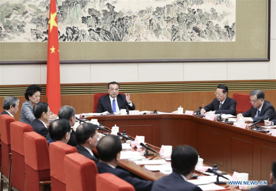 Chinese Premier Li Keqiang presides over a meeting soliciting opinions on the annual government work report from non-Communist parties, All-China Federation of Industry and Commerce and those without party affiliations, in Beijing, capital of China, Jan. 24, 2018. (Xinhua/Pang Xinglei)