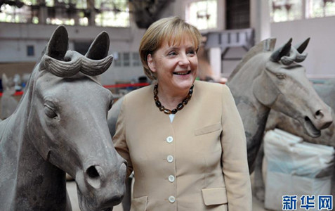 German Chancellor Angela Merkel poses for a photo between two horse statues at the Terracotta Army site in Xi'an, China, in July 2010. Merkel, who celebrated her 56th birthday in Xi'an, was born in the Year of the Horse according to the Chinese zodiac. The German chancellor was on a five-day visit to Russia, China and Kazakhstan. (Photo/Xinhua) German Chancellor Angela Merkel poses for a photo between two horse statues at the Terracotta Army site in Xi'an, China, in July 2010. Merkel, who celebrated her 56th birthday in Xi'an, was born in the Year of the Horse according to the Chinese zodiac. The German chancellor was on a five-day visit to Russia, China and Kazakhstan. (Photo/Xinhua)