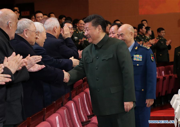 Chinese President Xi Jinping, also general secretary of the Communist Party of China (CPC) Central Committee and chairman of the Central Military Commission, attends a performance for retired military officials and veterans in Beijing, capital of China, Feb. 2, 2018. Xi on Friday extended Spring Festival, or Chinese Lunar New Year, greetings to military veterans. (Xinhua/Li Gang)