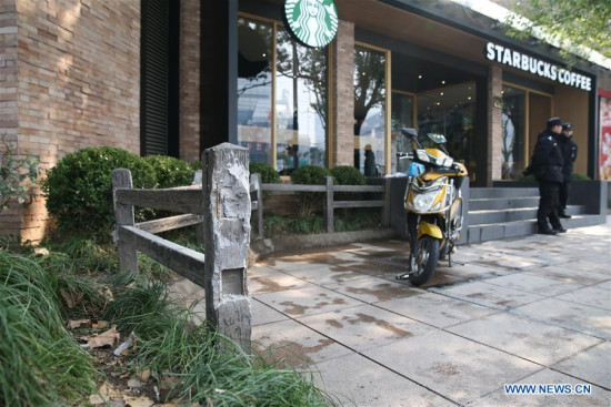 Photo taken on Feb. 2, 2018 shows a fence in front of a coffee shop damaged by the minivan in Huangpu District of east China's Shanghai. (Xinhua/Ding Ting)