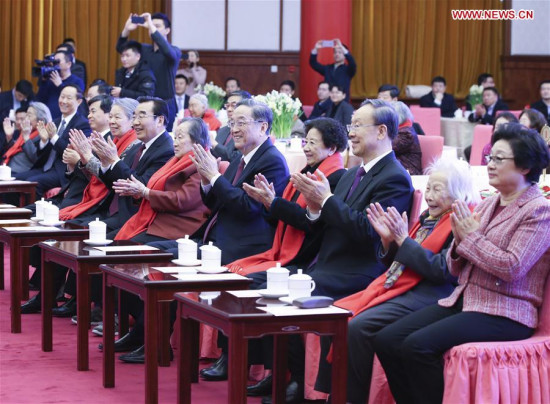 Yu Zhengsheng, chairman of the National Committee of the Chinese People's Political Consultative Conference (CPPCC), attends a Spring Festival reception held by CPPCC for the widows of late renowned figures in Beijing, capital of China, Feb. 1, 2018. (Xinhua/Yao Dawei)