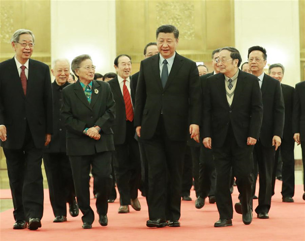 Chinese President Xi Jinping (2nd R, front) and other senior leaders Yu Zhengsheng, Wang Yang, Wang Huning and Han Zheng attend a gathering and extend lunar New Year greetings to leaders from non-Communist parties, the All-China Federation of Industry and Commerce and those without party affiliation in Beijing, capital of China, Feb. 6, 2018. (Xinhua/Ding Lin)