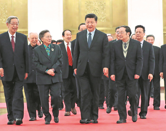 General Secretary Xi Jinping attends a Spring Festival gathering with representatives of non-Communist parties, the All-China Federation of Industry and Commerce, and those without party affiliation, in Beijing on Tuesday. (DING LIN / XINHUA)