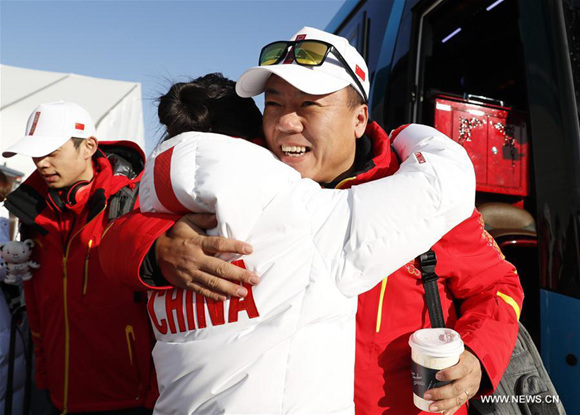 Chairwoman of China Figure Skating Association Shen Xue (L) hugs her husband, head coach of China's figure skating team Zhao Hongbo upon his arrival at Olympic Village in Gangneung, South Korea, Feb. 6, 2018. The 2018 PyeongChang Olympic Winter Games will kick off here on Feb. 9. (Xinhua/Han Yan)