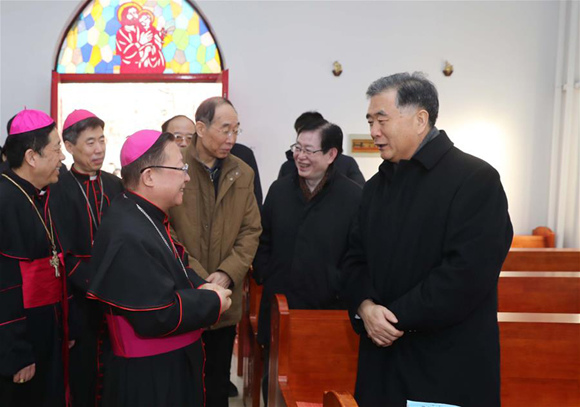 Chinese Vice Premier Wang Yang (1st R), also a member of the Standing Committee of the Political Bureau of the Communist Party of China (CPC) Central Committee, visits the Chinese Catholic Patriotic Association and the Bishops' Conference of Catholic Church in China, in Beijing, capital of China, Feb. 6, 2018. Wang visited some national religious associations on Tuesday and extended New Year greetings to religious circles in China ahead of the Spring Festival. (Xinhua/Liu Weibing)  BEIJING, Feb. 6 (Xinhua) -- Vice Premier Wang Yang has stressed full implementation of the basic policy of the Communist Party of China (CPC) on religious affairs and upholding the principle that religions in China must be Chinese in orientation.  Wang, also a member of the Standing Committee of the Political Bureau of the CPC Central Committee, made the remarks Tuesday while visiting some national religious associations in Beijing, including the Buddhist Association of China, the Taoist Association of China, the Islamic Association of China, the Chinese Catholic Patriotic Association, and the Bishops' Conference of Catholic Church in China.  He said active guidance should be provided to religious groups so that they can adapt to socialist society, and efforts should be made to unite religious personages and followers in making new contribution to the building of a moderately prosperous society in all respects and to realizing the Chinese Dream of the national rejuvenation.  Wang extended New Year greetings to religious circles in China ahead of the Spring Festival, or the Chinese Lunar New Year, which falls on Feb. 16 this year.  He expressed appreciation of the role of religious groups in maintaining social stability and ethnic unity, promoting public interests and philanthropy, and carrying out external exchanges.  Religious circles and believers are a positive force in building socialism with Chinese characteristics, Wang said.  He said that since the 18th CPC National Congress in 2012, the CPC Central Committee with Xi Jinping at the core has offered full respect and protection for the freedom of religious belief and has been working to improve the rule of law in administering religious affairs.  The CPC Central Committee supports the self-construction of patriotic religious associations, he said.  Wang called on religious circles in China to carefully study and implement Xi Jinping Thought on Socialism with Chinese Characteristics for a New Era and the spirit of the 19th CPC National Congress.  He required efforts to guide the religious circles and followers to rally closely around the CPC and the government.  Party committees and governments at all levels should give care and support to religious groups and help them with their realistic needs, he said.