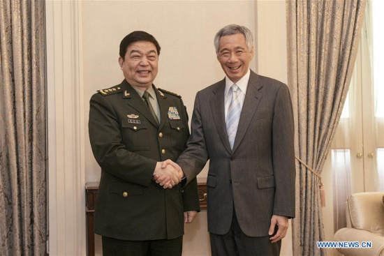 Singaporean Prime Minister Lee Hsien Loong (R) meets with visiting Chinese Defense Minister and State Councilor Chang Wanquan in Singapore on Feb. 7, 2018. (Xinhua/Then Chih Wey)