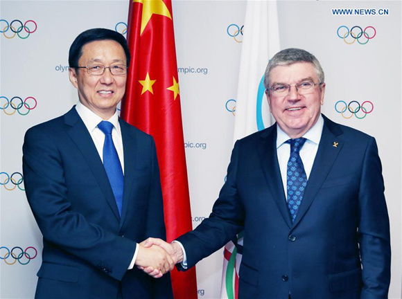 Chinese President Xi Jinping's special envoy Han Zheng (L), also a member of the Standing Committee of the Political Bureau of the Communist Party of China Central Committee, meets with Thomas Bach, president of the International Olympic Committee (IOC) in PyeongChang, South Korea, Feb. 9, 2018. (Xinhua/Yao Dawei)