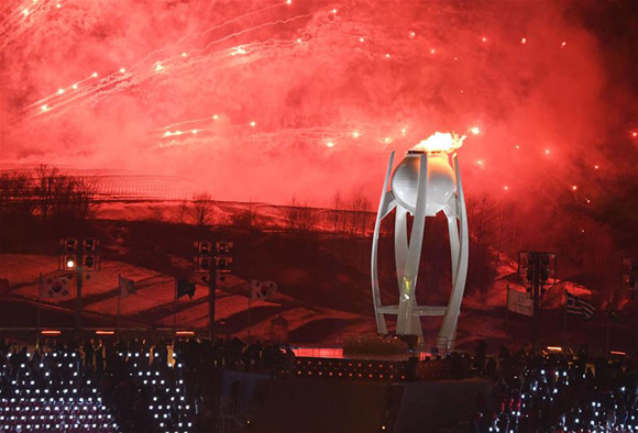 The main torch is lit up during the opening ceremony of the 2018 PyeongChang Winter Olympic Games held at PyeongChang Olympic Stadium, South Korea, Feb. 9, 2018. (Xinhua/Bi Xiaoyang)