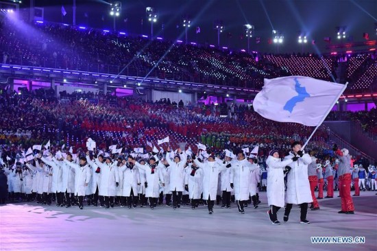 The Democratic People's Republic of Korea (DPRK) and South Korea marched together under a unified Korean flag during the opening ceremony of the 2018 PyeongChang Winter Olympic Games at PyeongChang Olympic Stadium in PyeongChang, South Korea, Feb. 9, 2018. (Xinhua/Lui Siu Wai)