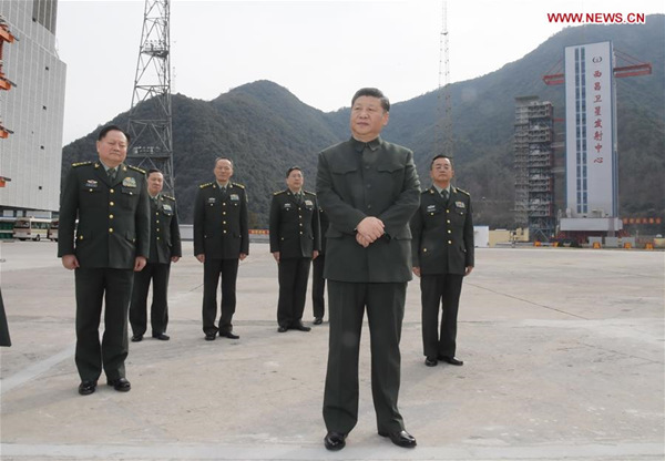 Chinese PresidentXi Jinping(front), also general secretary of the Communist Party of China Central Committee and chairman of the Central Military Commission, visits a satellite launch site at a military base in southwest China's Sichuan Province, Feb. 10, 2018. Xi visited the military base on Saturday ahead of the Spring Festival, which falls on Feb. 16 this year. He extended festival greetings to all officers and soldiers of thePeople's Liberation Armyand the armed police force, and all militia and reserve personnel. (Xinhua/Li Gang)